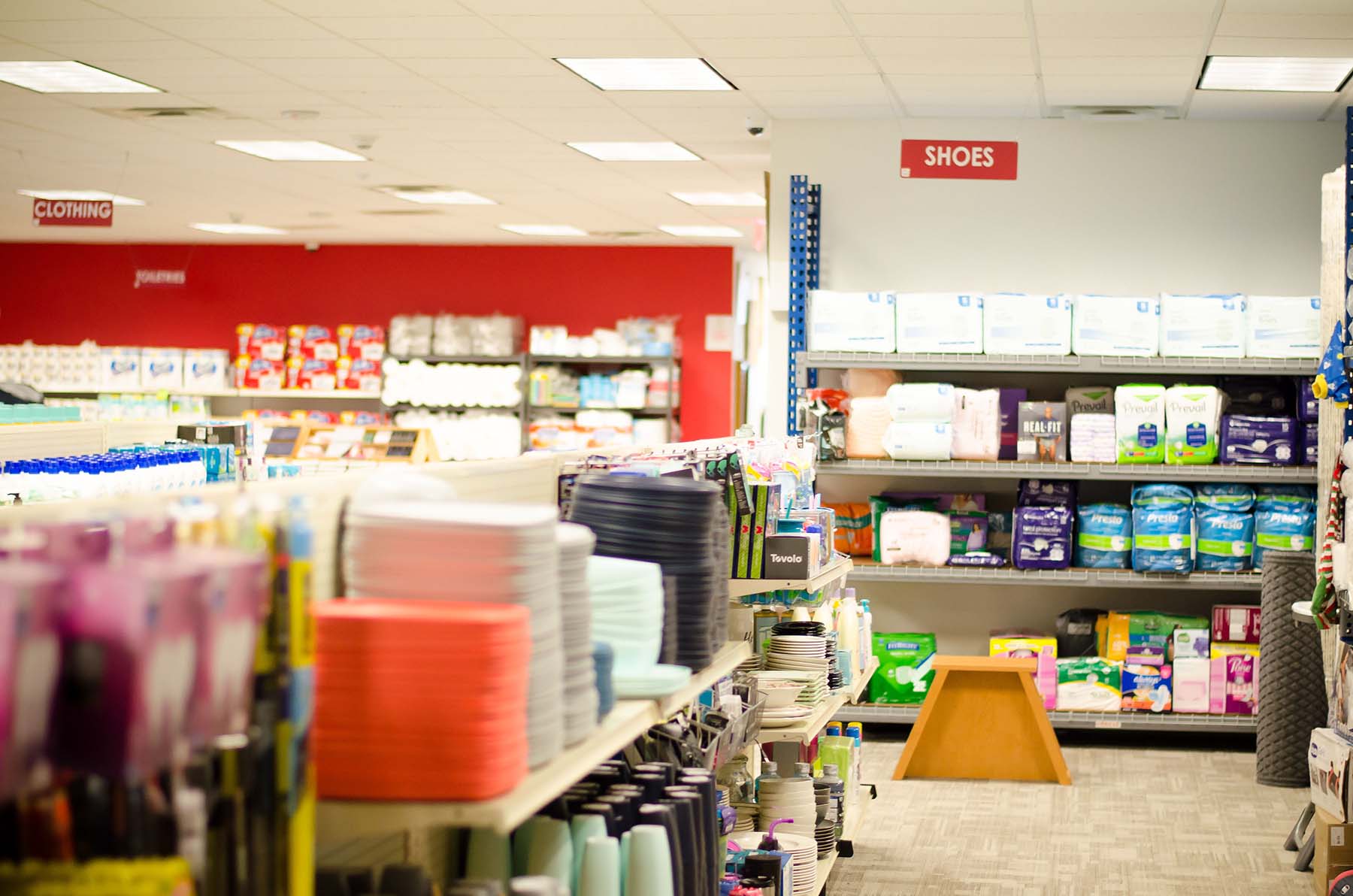Shelves of free household essentials inside Minnie's Boutique