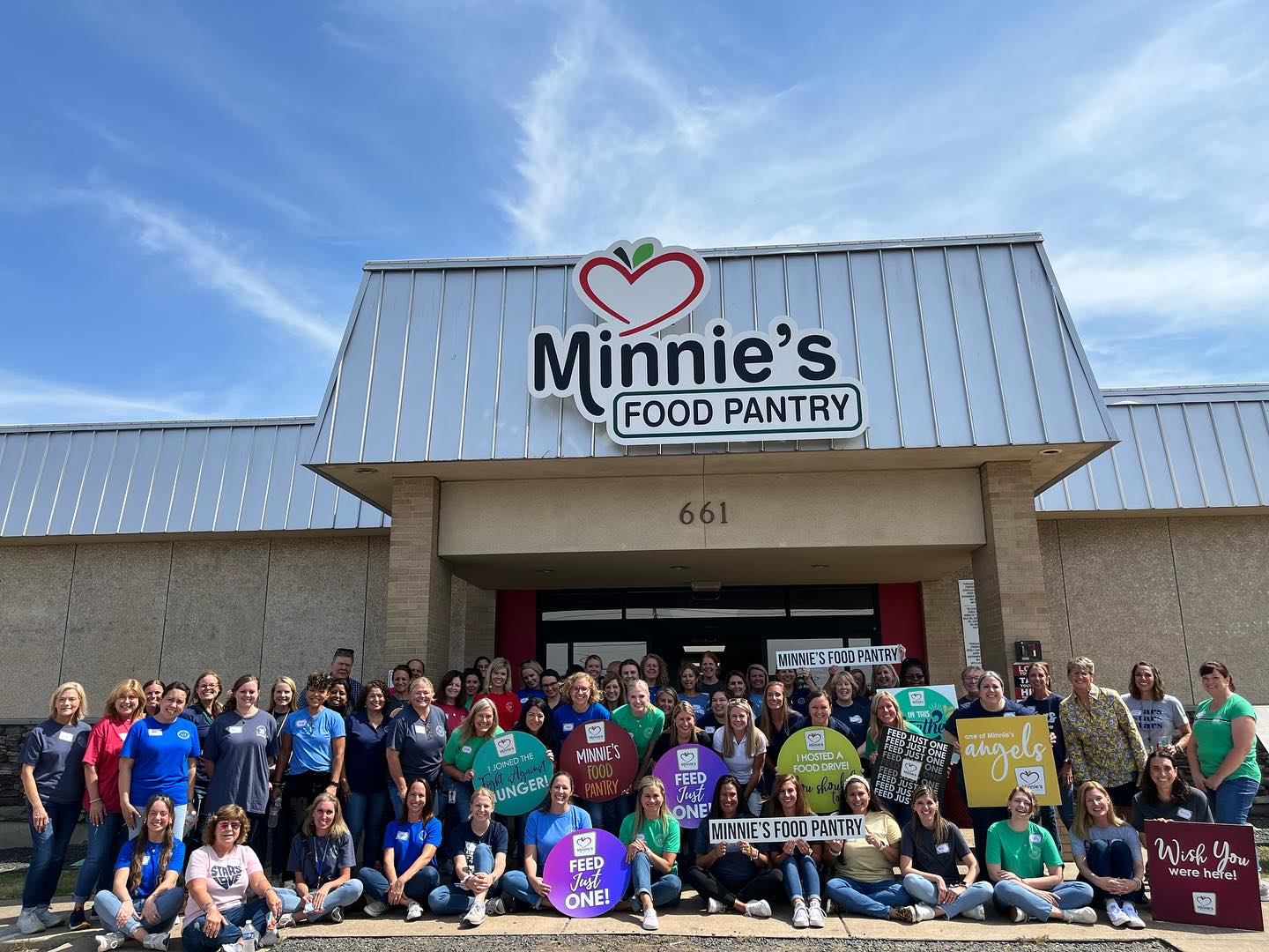 The Minnie's Food Pantry team outside the pantry at 661 18th Street, Plano